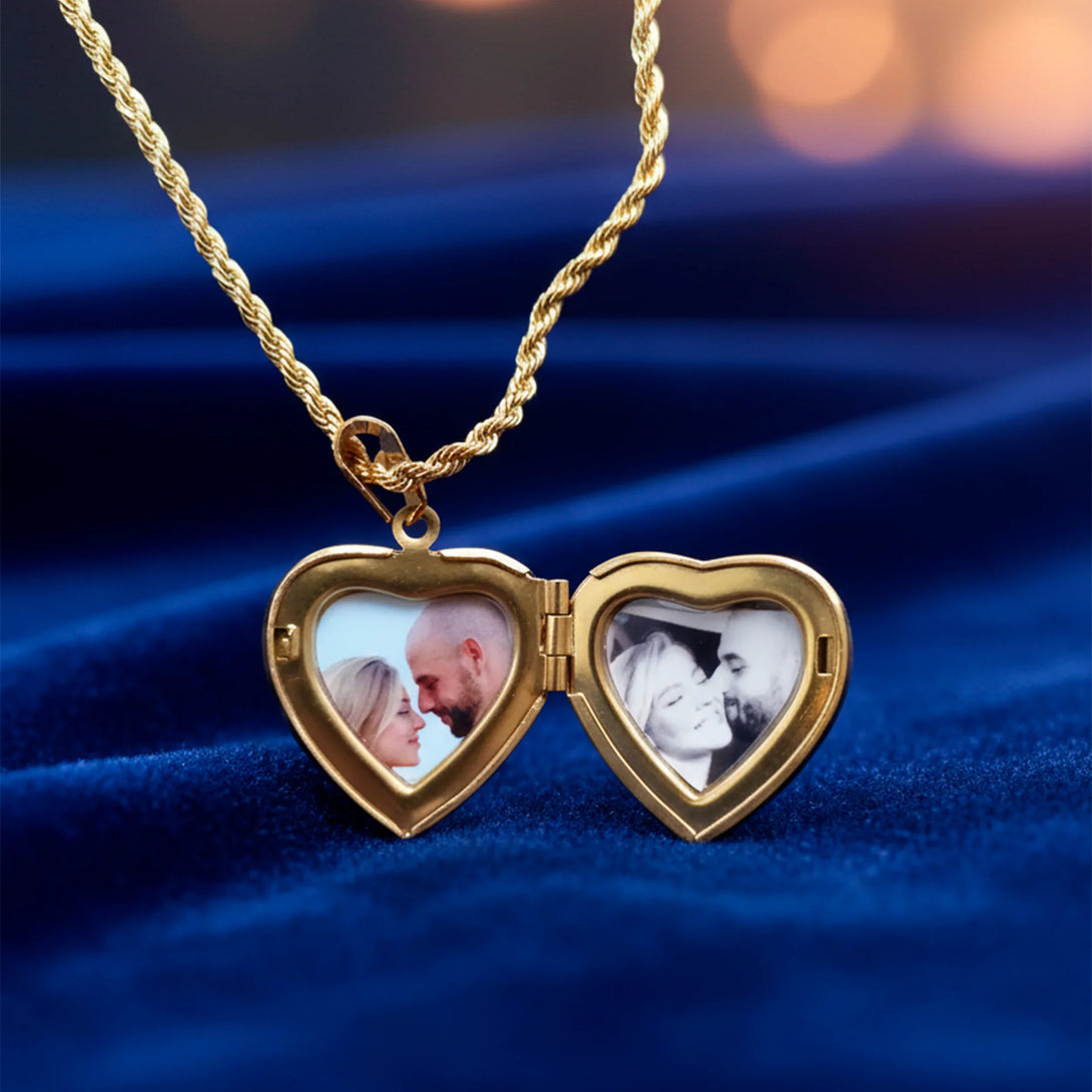 personalized gold heart-shaped locket necklace with couple photos on blue velvet background
