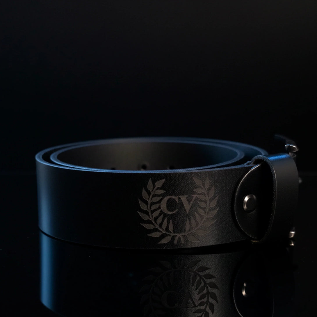 Personalized black leather belt with engraved CV and laurel design, men's gift set